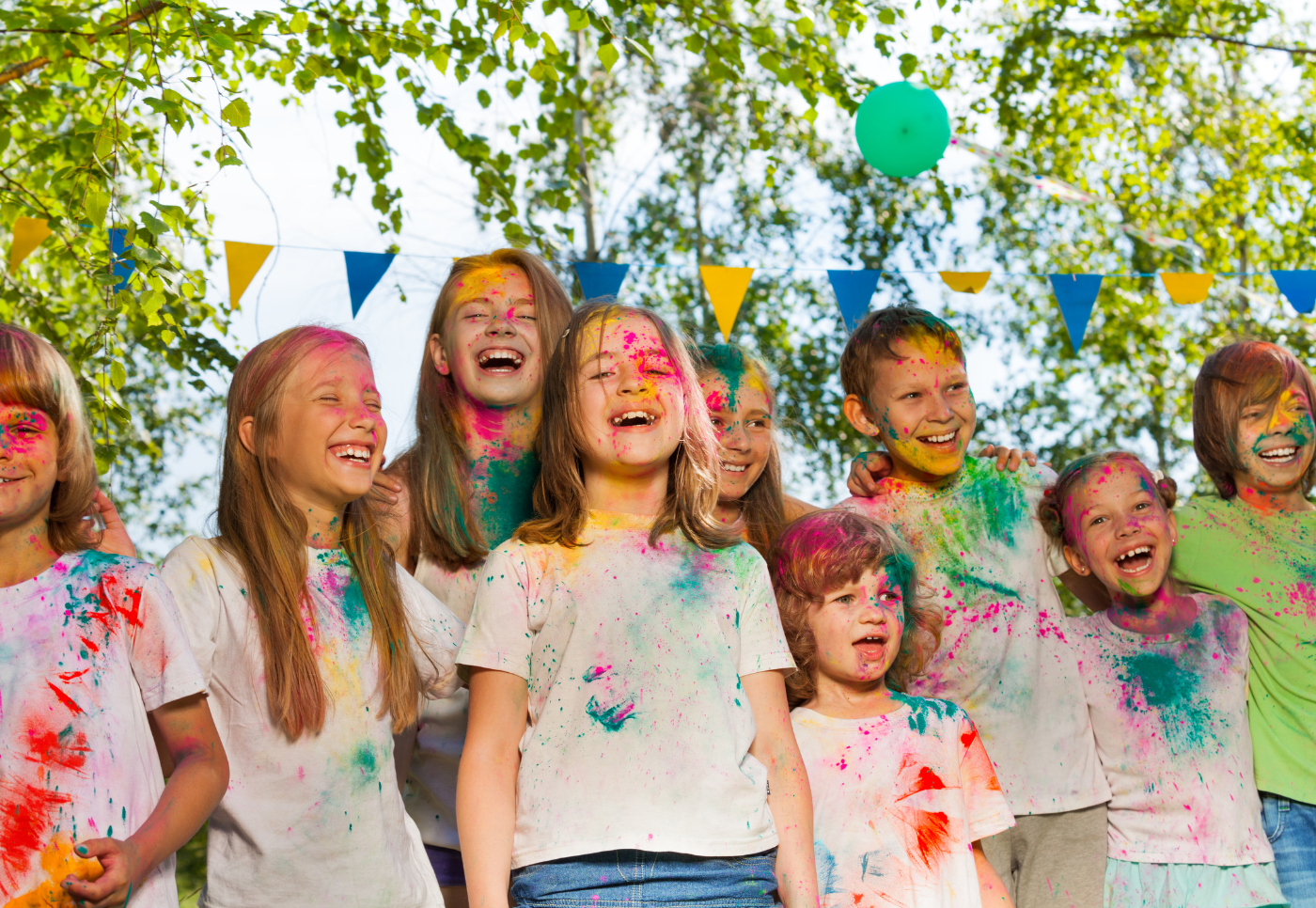 Group of friends together after playing with colours